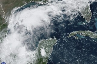 This Sunday, Sept. 8, 2024 satellite image provided by the National Oceanic and Atmospheric Administration shows a tropical disturbance in the Gulf of Mexico expected to bring significant rainfall to parts of Texas and Louisiana this week, possibly developing into a stronger storm, including a hurricane, according to the National Weather Service. (NOAA via AP)