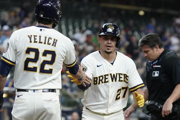 Milwaukee Brewers' Willy Adames is congratulated by Christian Yelich after hitting a two-run home run during the first inning of a baseball game against the Houston Astros Wednesday, May 24, 2023, in Milwaukee. (AP Photo/Morry Gash)