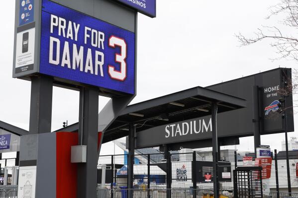 A sign shows support for injured Buffalo Bills NFL football player Damar Hamlin outside Highmark Stadium in Orchard Park, N.Y., Thursday Jan. 5, 2023. (AP Photo/Jeffrey T. Barnes)