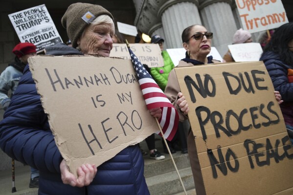 Supporters of Judge Hannah Dugan hold a rally in Milwaukee at the U.S. Courthouse in Milwaukee on Friday, April 25, 2025. (Lee Matz/Milwaukee Independent via AP)
