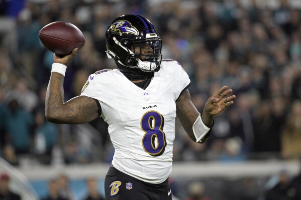 Baltimore Ravens quarterback Lamar Jackson passes against the Jacksonville Jaguars in the first half of an NFL football game Sunday, Dec. 17, 2023, in Jacksonville, Fla. (AP Photo/Phelan M. Ebenhack)