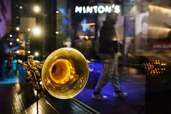 A trumpet belonging to Louis Armstrong is displayed at the National Museum of African American Music, Saturday, Jan. 30, 2021, in Nashville, Tenn. The museum has 1,600 artifacts in the collection, which also includes clothes and a Grammy Award belonging to Ella Fitzgerald, and a guitar owned by B.B. King. But to make the best use out of the space, the exhibits are layered with interactive features, including 25 stations that allow visitors to virtually explore the music. (AP Photo/Mark Humphrey)