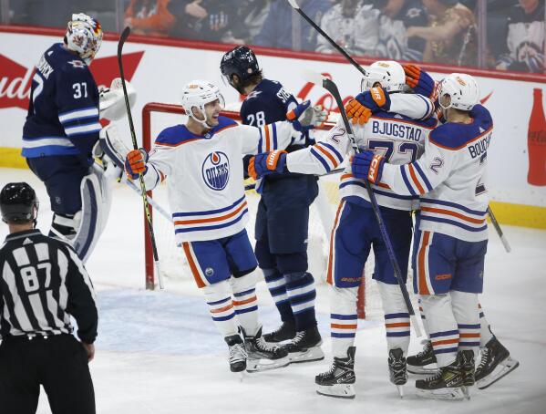 Morrissey has 2 goals, assist as Jets outlast Oilers 7-5