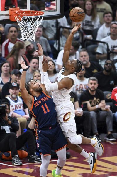 Cleveland, United States. 18th Apr, 2023. New York Knicks Julius Randle  (30) is fouled by Cleveland Cavaliers Jarrett Allen (31) in the second half  at Rocket Mortgage FieldHouse in Cleveland, Ohio on