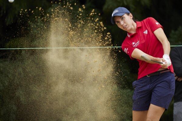 Carlota Ciganda, of Spain, hits from the bunker on the fifth hole during the final round of the LPGA Portland Classic golf tournament in Portland, Ore., Sunday, Sept. 3, 2023. (AP Photo/Craig Mitchelldyer)