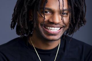This photo provided by Dante Bailey shows author Nick Brooks. Brooks has reached a 7-figure deal for his young adult thriller "Promise Boys," in which three boys at a Washington, D.C. charter school investigate the murder of their principal and learn hard truths about their education and community. According to Henry Holt Books for Young Readers, which announced the deal Wednesday, "Promise Boys" draws in part on Brooks' experiences as a teacher with at-risk kids. Henry Holt expects to release the book early in 2023. (Dante Bailey via AP)