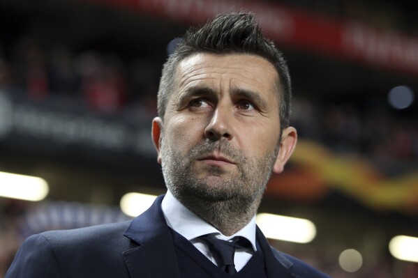 FILE - Dinamo Zagreb coach Nenad Bjelica prior to the Europa League soccer match between Benfica and Dinamo Zagreb in Lisbon, Thursday, March 14, 2019. German Bundesliga soccer team 1. FC Union Berlin has appointed Croatian coach Nenad Bjelica as the successor to Urs Fischer in a bid to improve the team’s fortunes and leave the Bundesliga’s relegation zone. Union announced Bjelica’s signing on Sunday without giving details of his contract. (AP Photo/Armando Franca, File)