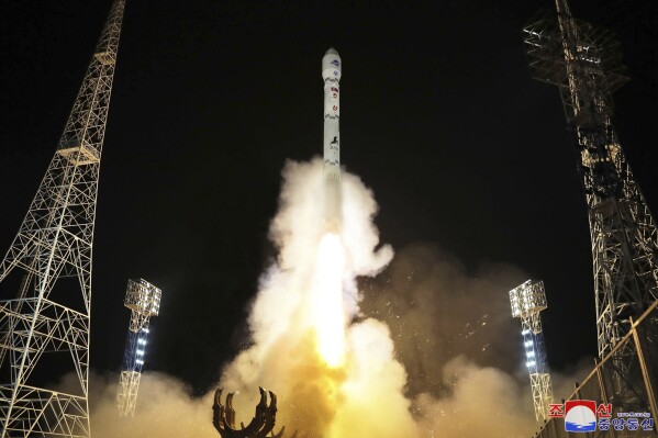 FILE - This photo provided by the North Korean government shows what the country said is the launch of the Malligyong-1, a military spy satellite, into orbit on Tuesday, Nov. 21, 2023. Independent journalists were not given access to cover the event depicted in this image distributed by the North Korean government. The content of this image is as provided and cannot be independently verified. Korean language watermark on image as provided by source reads: "KCNA" which is the abbreviation for Korean Central News Agency. (Korean Central News Agency/Korea News Service via AP, File)
