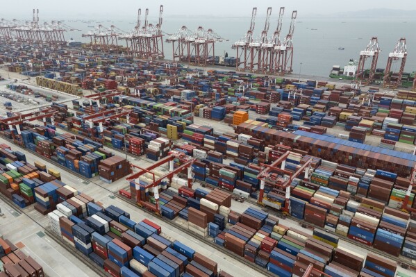 Shipping containers are seen ready for transport at the Guangzhou Port in the Nansha district in southern China's Guangdong province, April 17, 2025. (AP Photo/Ng Han Guan, File)