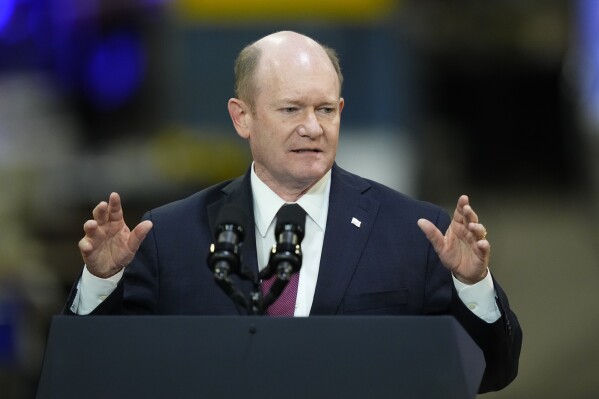 FILE - Sen. Chris Coons, D-Del., speaks in Bear, Del., Nov. 6, 2023. More of President Joe Biden's top Senate allies are demanding that the U.S. act directly to ease Palestinian civilian suffering in Gaza and are joining calls to cut military aid if Israel refuses to change course. Even Coons, Biden's closest confidant in Congress, says it is time to get tougher with the Israeli government. (AP Photo/Matt Rourke, File)
