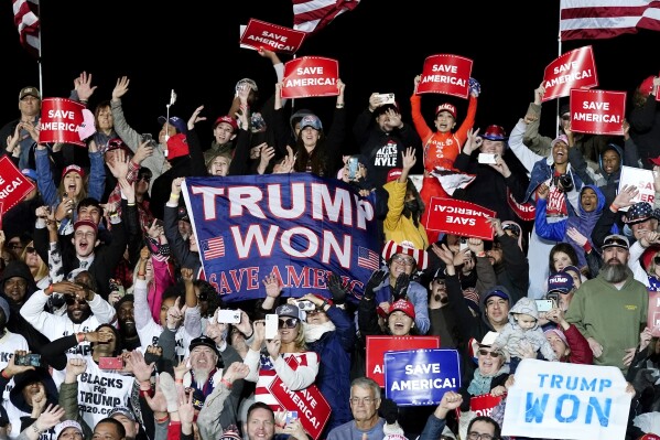 FILE - Supporters of former President Donald Trump cheer as he speaks at a Save America Rally. Jan. 15, 2022, in Florence, Ariz. (APPhoto/Ross D. Franklin, File)