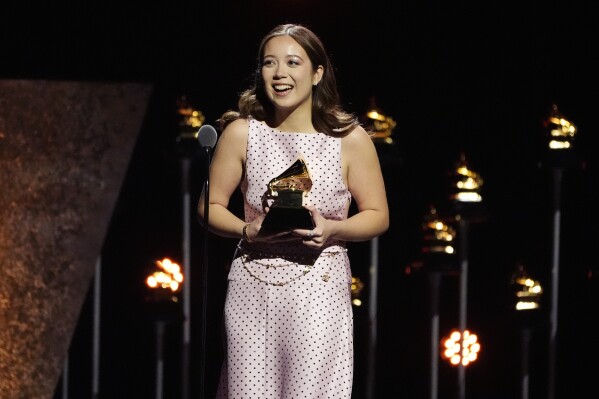 Laufey accepts the award for best traditional pop vocal album for 