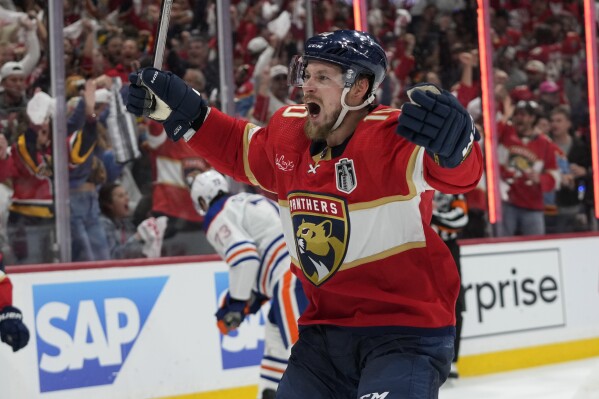 Florida Panthers right wing Vladimir Tarasenko (10) reacts after defenseman Niko Mikkola scored during the second period of Game 2 of the NHL hockey Stanley Cup Finals against the Edmonton Oilers, Monday, June 10, 2024, in Sunrise, Fla. (AP Photo/Wilfredo Lee)