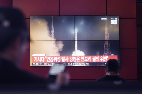 A TV screen shows a file image of North Korea's rocket launch during a news program at a bus terminal in Seoul, South Korea, Monday, May 27, 2024. North Korea on Monday, May 27, 2024, launched a missile into the sea, Japan and South Korea said, hours after North Korea announced plans to put a rocket into orbit apparently carrying its second military reconnaissance satellite. (AP Photo/Ahn Young-joon)