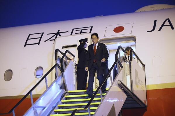 Japan's Prime Minister Fumio Kishida arrives in Perth to begin a 3-day-visit to Australia, on Friday, Oct. 21, 2022. (Trevor Collens/Pool via AP)