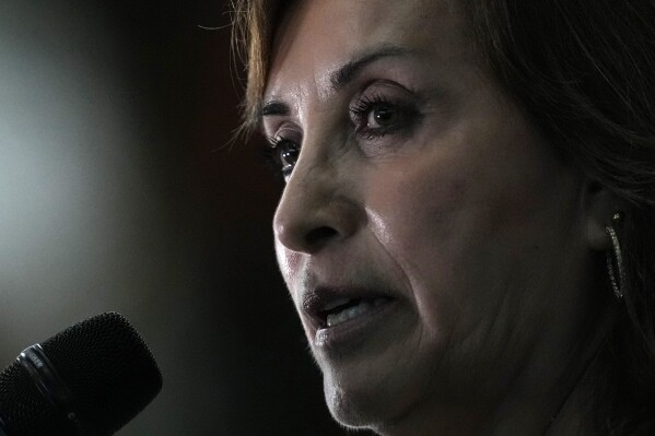 FILE - Peru's President Dina Boluarte talks to the press at the end of the Amazon Summit in Belem, Brazil, Aug. 8, 2023. Boluarte testified to prosecutors behind closed doors Friday, April 5, 2024, as authorities investigate whether she illegally received hundreds of thousands of dollars in cash, luxury watches and jewelry. (AP Photo/Eraldo Peres, File)