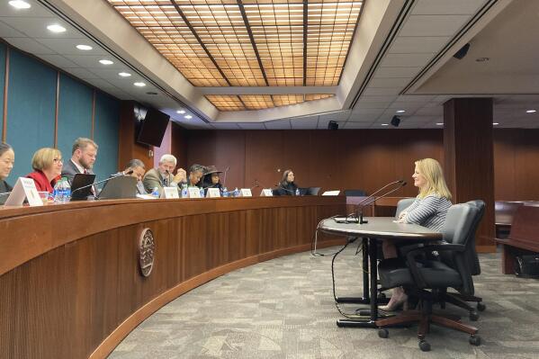 Georgia Human Services Commissioner Candice Broce, right, testifies in favor of a bill that would slow the flow of children into foster care on Thursday, Feb. 16, 2023, at the Capitol in Atlanta. Lawmakers say they plan to rewrite the bill after others raised concerns. (AP Photo/Jeff Amy)