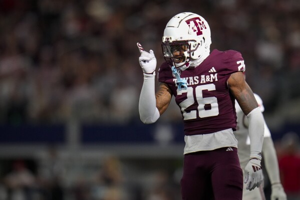 Texas A&M defensive back Will Lee III reacts after a play against Arkansas during the second half of an NCAA college football game, Saturday, Sept. 28, 2024, in Arlington, Texas. Texas A&M won 21-17. (AP Photo/Julio Cortez, File)