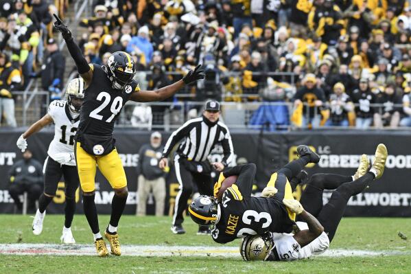 Pittsburgh Steelers Damontae Kazee intercepts a pass intended for New Orleans Saints wide receiver Jarvis Landry (5) during the second half of an NFL football game in Pittsburgh, Sunday, Nov. 13, 2022. The Steelers won 20-10. (AP Photo/Don Wright)