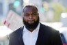 FILE - Cardell Hayes enters Orleans Parish Criminal District Court in New Orleans, Sept. 20, 2023, for a hearing regarding his retrial for shooting former NFL star Will Smith. Hayes is scheduled for sentencing Thursday, April 25, 2024, in a New Orleans courtroom. (AP Photo/Gerald Herbert, File)