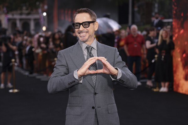 Robert Downey Jr. poses for photographers upon arrival at the premiere for the film 'Oppenheimer' on Thursday, July 13, 2023 in London. (Vianney Le Caer/Invision/AP)