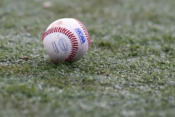 The NCAA logo is seen on a baseball during an NCAA college baseball tournament regional game between Louisiana-Lafayette and Mississippi State in Lafayette, La., Monday, June 2, 2014. (AP Photo/Jonathan Bachman, file)