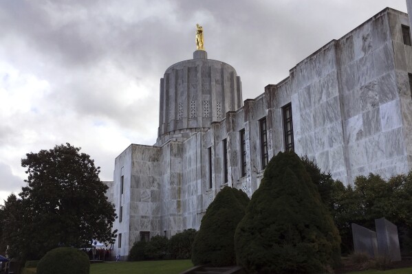 FILE - Clouds hover over the Oregon Capitol, Jan. 11, 2018, in Salem, Ore. Rep. E. Werner Reschke, a Republican Oregon lawmaker, has suggested that “you don’t want” Muslims, atheists and other non-Christians to serve in elected office. Reschke made the comments in a Jan. 17, 2024, appearance on “Save the Nation,” a talk show streamed on Facebook that is affiliated with the National Association of Christian Lawmakers, Oregon Public Broadcasting reported Monday, Jan 29. (AP Photo/Andrew Selsky, File)