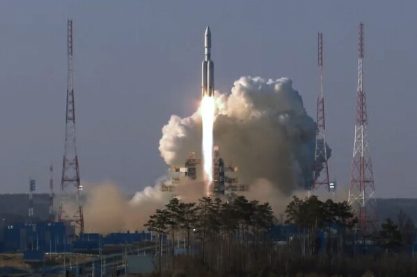 In this grab taken from video released by Roscosmos space corporation on Thursday, April 11, 2024 an Angara-A5 rocket lifts off from Vostochny space launch facility outside the city of Tsiolkovsky, about 200 kilometers (125 miles) from the city of Blagoveshchensk in the far eastern Amur region, Russia. Russia on Thursday successfully test-launched a new heavy-lift rocket from its Far Eastern space complex, a lift-off that comes after two aborted attempts earlier in the week. (Roscosmos Space Corporation via AP)