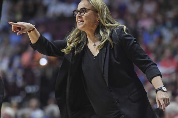FILE - Las Vegas Aces head coach Becky Hammon calls out instructions to her team during a WNBA basketball game against the Connecticut Sun, Sunday, July 17, 2022, in Uncasville, Conn. Hammon was named WNBA Coach of the Year on Friday , Aug. 26, 2022, after she led the Las Vegas Aces to the top of the league in her first year. (Sean D. Elliot/The Day via AP, File)