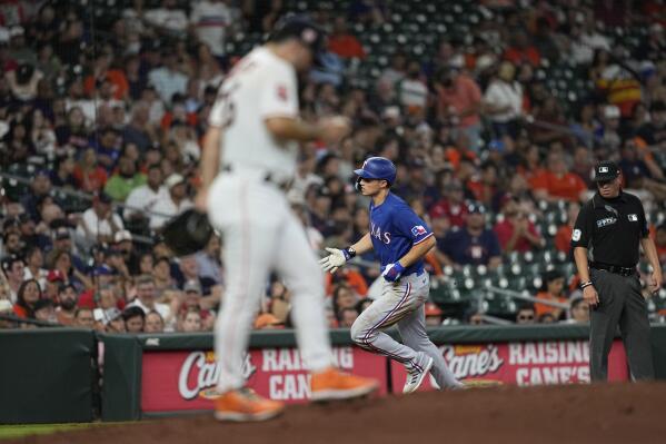 Diaz hits slam, Astros tag Pérez, rally past Rangers 7-5