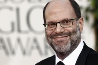 FILE - Scott Rudin arrives at the Golden Globe Awards in Beverly Hills, Calif. on Jan. 16, 2011. Rudin, one of the most successful and powerful producers, with a heap of Oscars and Tonys to show for it, has long been known for his torturous treatment of an ever-churning parade of assistants. Such behavior has long been engrained — and sometimes even celebrated — in show business. (AP Photo/Matt Sayles, File)