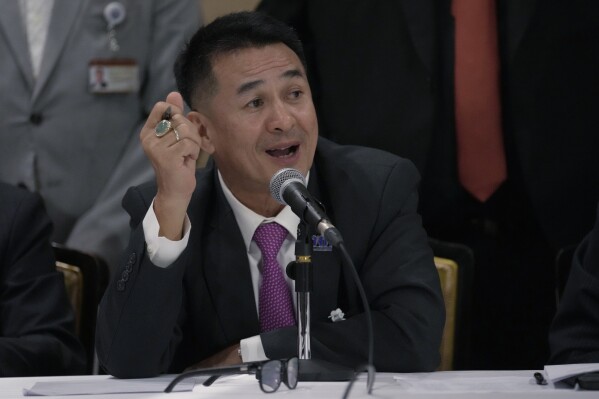 Leader of Pheu Thai party Chonlanan Srikaew speaks during a news conference at Parliament in Bangkok, Thailand Monday, Aug. 21, 2023. The populist Pheu Thai party on Monday announced its plan to form Thailand’s next government with an 11-party coalition that includes two pro-military parties affiliated with outgoing Prime Minister Prayuth Chan-ocha. (AP Photo/Sakchai Lalit)