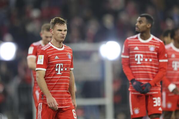 Bayern's Joshua Kimmich, left, reacts after the Bundesliga soccer match between Bayern Munich and FC Cologne at the Allianz Arena in Munich, Germany, Tuesday, Jan. 24, 2023. (AP Photo/Alexandra Beier)