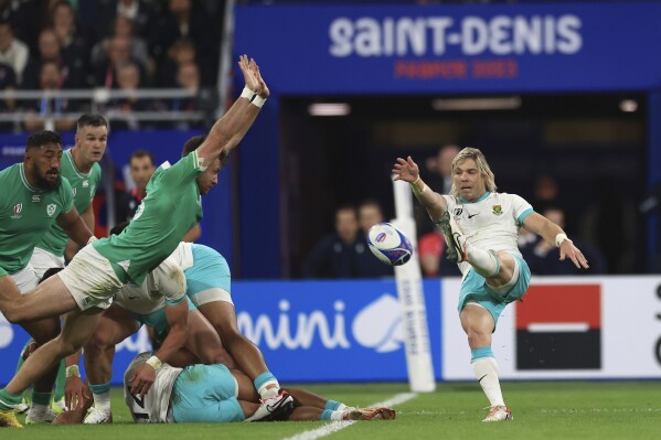 South Africa's Faf de Klerk kicks the ball clear during the Rugby World Cup Pool B match between South Africa and Ireland at the Stade de France in Saint-Denis, outside Paris, Saturday, Sept. 23, 2023. (AP Photo/Aurelien Morissard)