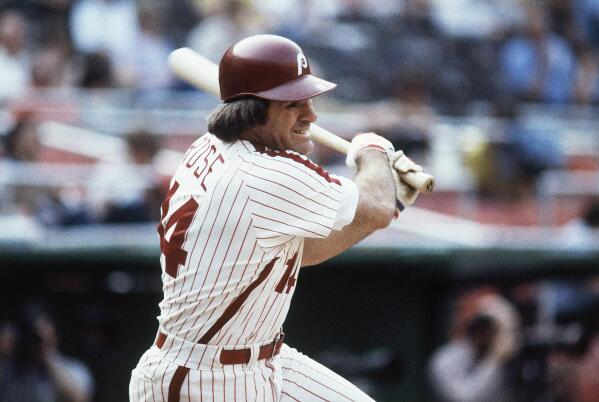 FILE - Philadelphia Phillies' Pete Rose bats during a 1980 baseball game. Rose will make an appearance on the field in Philadelphia next month. Baseball’s career hits leader will be part of Phillies alumni weekend, and will be introduced on the field alongside many former teammates from the 1980 World Series championship team on Aug. 7. (AP Photo, File)