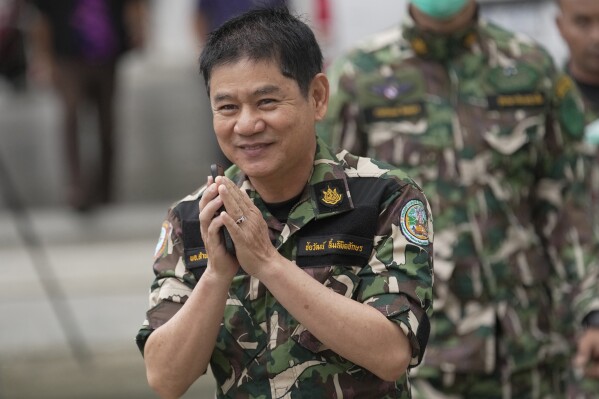 Chaiwat Limlikitaksorn, a former chief of Kaeng Krachan National Park in the western Phetchaburi province, arrives at The Central Criminal Court of Corruption and Misconduct in Bangkok to hear his verdict in his trial, Thursday, Sept. 28, 2023. The court on Thursday acquitted four national park employees of the kidnapping and murder of an Indigenous rights activist who disappeared under suspicious circumstances more than nine years ago. (AP Photo/Sakchai Lalit)