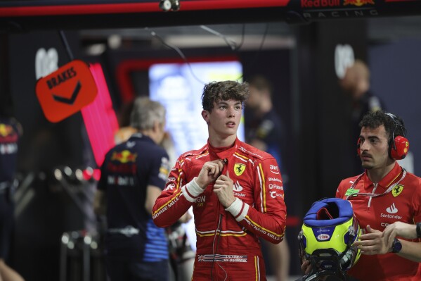 Ferrari driver Oliver Bearman of Britain watches at pits during qualifying session ahead of the Formula One Saudi Arabian Grand Prix at the Jeddah Corniche Circuit, in Jedda, Saudi Arabia, Friday, March 8, 2024. Saudi Arabian Grand Prix will be held on Saturday, March 9, 2024. (AP Photo/Giuseppe Cacace/Pool)