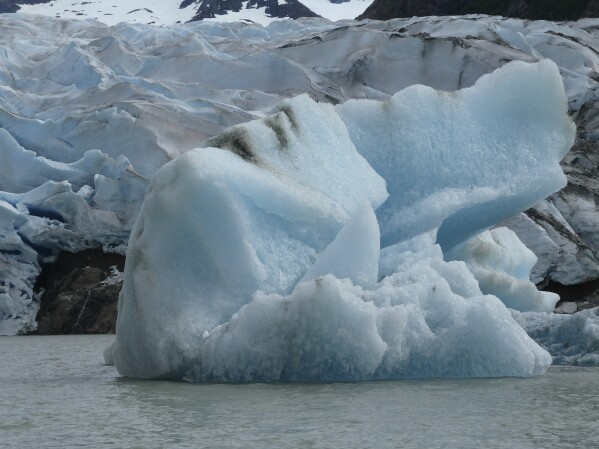 An iceberg floats in front of the Mendenhall Glacier on June 8, 2023, in Juneau, Alaska. (AP Photo/Becky Bohrer)