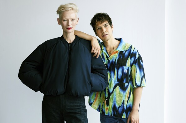 Tilda Swinton, left, and Julio Torres pose for a portrait in New York to promote their film "Problemista" on Tuesday, Feb. 27, 2024. (Photo by Taylor Jewell/Invision/AP)