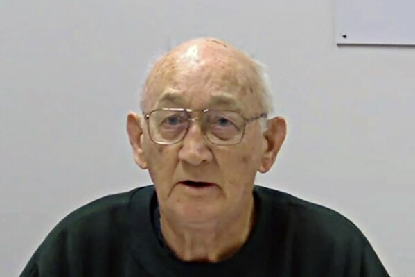 In this photo made from video on May 27, 2015, Gerald Ridsdale gives evidence during a child sex abuse royal commission. Australian ex-priest Gerald Ridsdale, who is serving a 39-year sentence for a series of convictions for abusing children, pleaded guilty Thursday to sexually abusing a 72nd victim. (Royal Commission/AAP Image via AP)