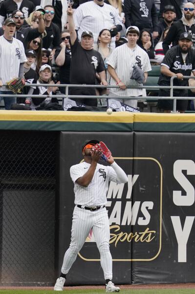 Eloy Jimenez leaves field on cart with hamstring injury; White Sox