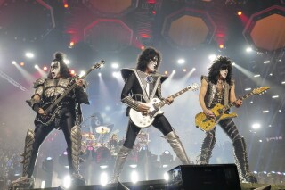 FILE - Gene Simmons, from left, Tommy Thayer, and Paul Stanley of KISS perform during the final night of the "Kiss Farewell Tour"at Madison Square Garden in New York on Dec. 2, 2023. (Photo by Evan Agostini/Invision/AP, File)