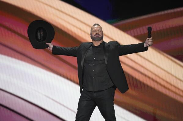 Host Garth Brooks speaks at the 58th annual Academy of Country Music Awards on Thursday, May 11, 2023, at the Ford Center in Frisco, Texas. (AP Photo/Chris Pizzello)