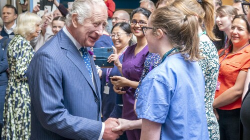 Britain's King Charles III, meets staff and patients at the Royal Infirmary of Edinburgh, to celebrate 75 years of the NHS at NHS Lothian, as part of the first Holyrood Week since his coronation, Scotland, Tuesday July 4, 2023. (Jane Barlow/Pool Photo via AP)