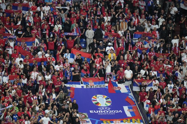 Serbia fans cheer during a Group C match between Serbia and England at the Euro 2024 soccer tournament in Gelsenkirchen, Germany, Sunday, June 16, 2024. (AP Photo/Alessandra Tarantino)