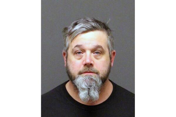 This undated photo provided by the Mohave County Sheriff's Office shows Michael Patrick Turland, 43, of Golden Valley, Ariz. Turland faces animal cruelty charges after 183 dead animals were found in a freezer at a home where he previously lived in Golden Valley. (Mohave County Sheriff's Office via AP)