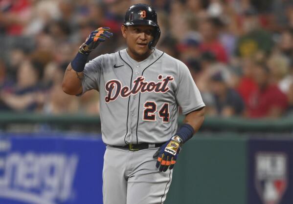 Detroit Tigers' Miguel Cabrera (24) and his family enter the field