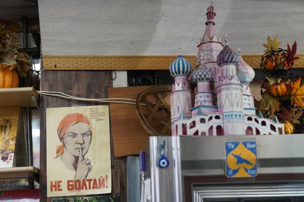 Signs from from Russia, Ukraine, and other countries are displayed at Moscow on the Hudson in New York, Wednesday, March 16, 2022. Angered by the deadly violence and the humanitarian crisis resulting from Russia's war on Ukraine, some Americans are dumping their frustrations on Russian businesses and brands — or anything that sounds Russian. Business owners and experts say it's the most intense anti-Russian sentiment they've seen, but they call the behavior irrational and misplaced, especially when so many owners are denouncing Russian President Vladimir Putin's invasion, not to mention the fact that some of them are not even Russian. (AP Photo/Seth Wenig)