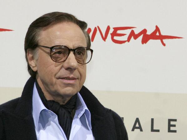 FILE - U.S. film director, writer and actor Peter Bogdanovich poses during a photo call for the presentation of the movie "The Dukes" at the Rome Film Festival in Rome on Oct. 23, 2007.  Bogdanovich, the Oscar-nominated director of "The Last Picture Show," and "Paper Moon," died Thursday, Jan. 6, 2022 at his home in Los Angeles. He was 82.  (AP Photo/Sandro Pace, File)