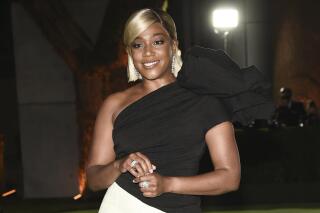 FILE - Actress Tiffany Haddish poses at the Academy Museum of Motion Pictures Opening Gala at the Academy of Motion Pictures Museum on on Sept. 25, 2021 in Los Angeles. Haddish was arrested Friday, Jan. 14, 2022, and charged with driving under the influence, authorities said.  The actor and comedian was detained after Peachtree City Police got a call about 2:30 a.m. regarding a driver asleep at the wheel on a highway, Assistant Police Chief Matt Myers said in a news release. (Photo by Dan Steinberg/Invision/AP, File)